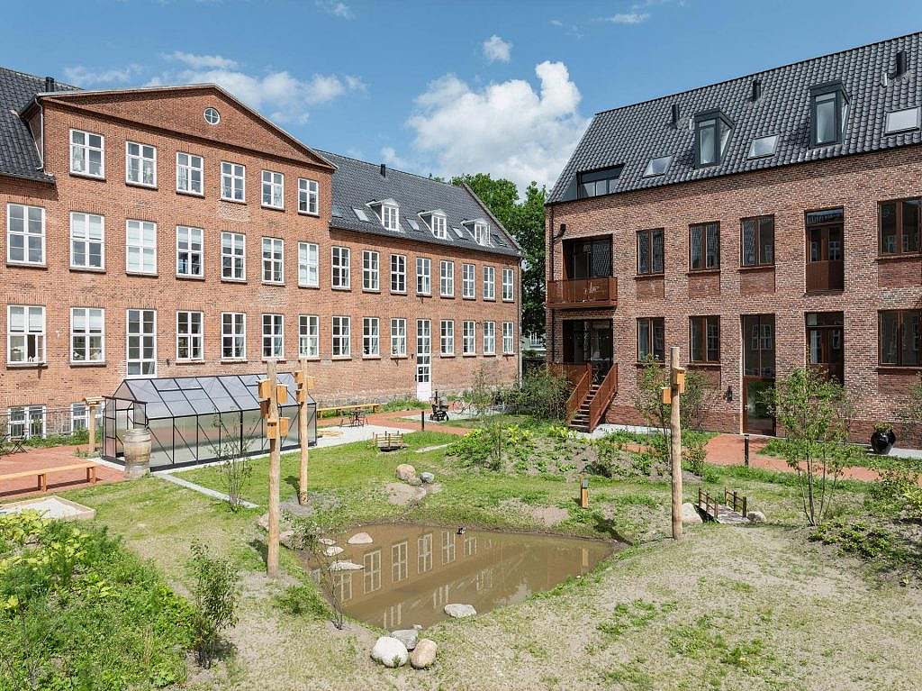 Renovering og nybyg giver smukt boligkompleks-min