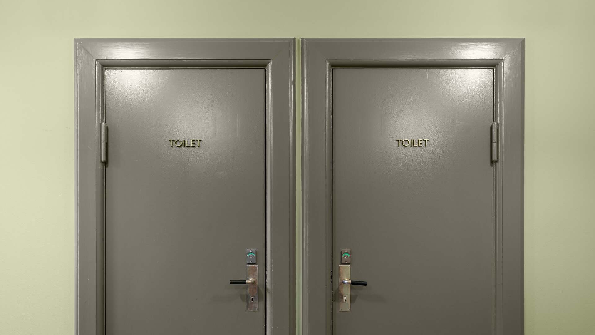 City and Harbour toilet signs in copper